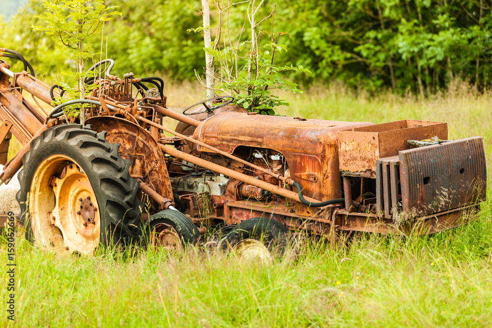Old agricultural machinery covered with rust Old agricultural machinery covered with rust