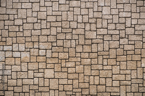 Brick wall texture close-up as background or wallpaper