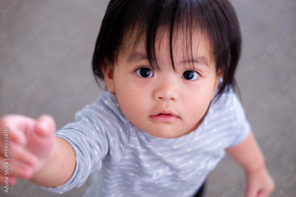 Cute asian baby girl. Portrait of Asian beautiful baby girl of 1 year and 3 months old. Cute asian baby girl. Portrait of Asian beautiful baby girl of 1 year and 3 months old.