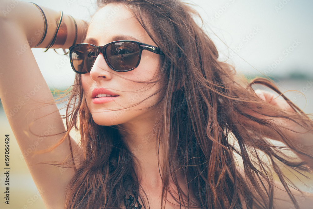 Portrait of a Woman With Sunglasses Portrait of a Woman With Sunglasses