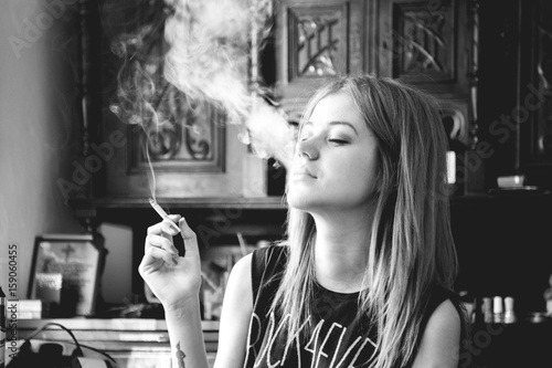 Young woman smoking a cigarette