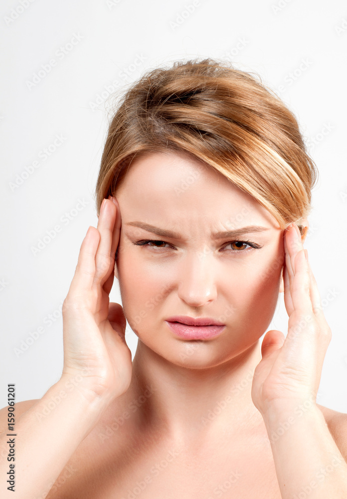 Woman having headache migraine Woman having headache migraine
