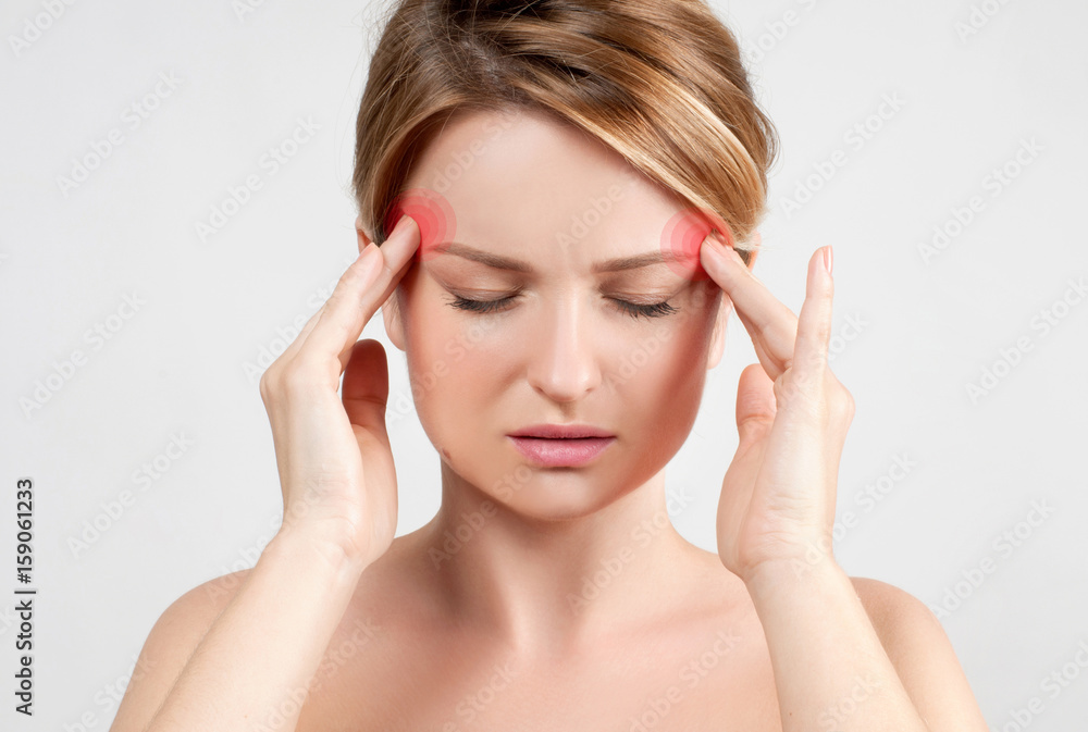 Woman having headache migraine