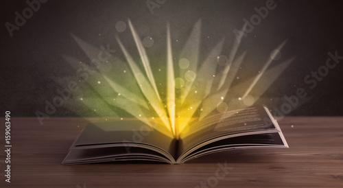 Fototapeta Naklejka Na Ścianę i Meble -  Yellow lights over book