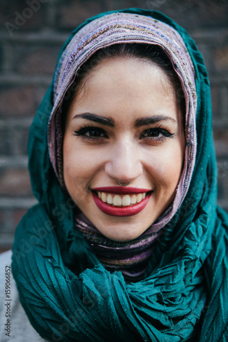 Beautiful persian woman wearing Muslim headscarf photo