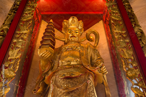 The Chinese golden goddess statue at Wat Borom Raja Kanjanapisek Wat Leng Nei Yee 2 Temple, People go to temple to pray for good luck and success in life.