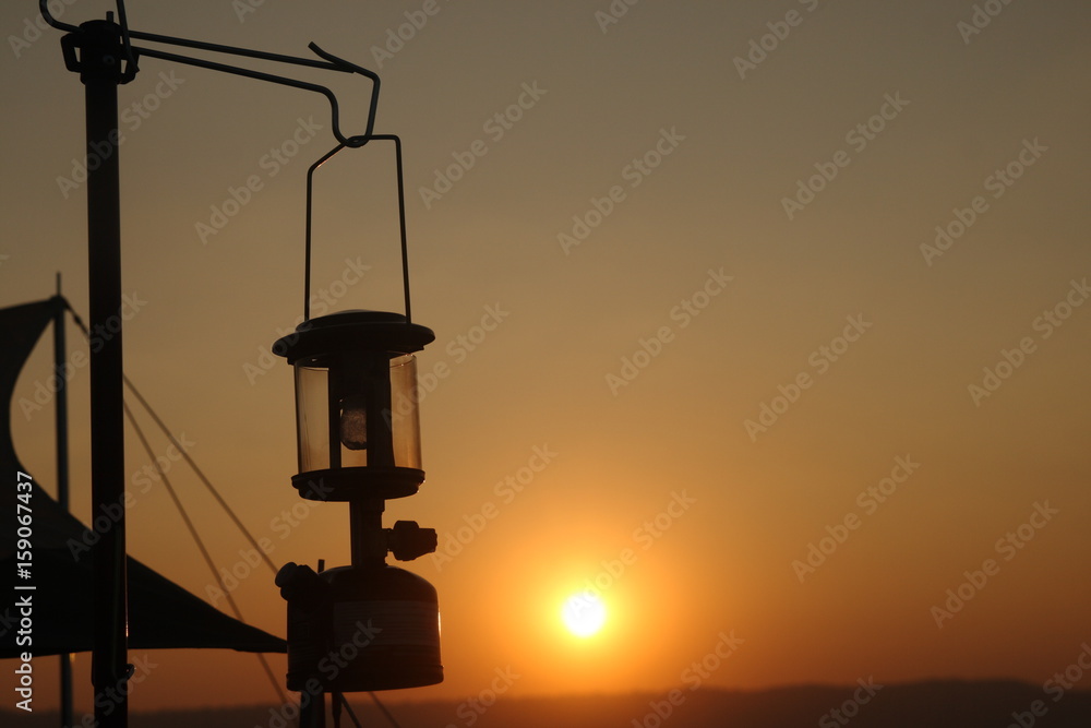silhouette old lamp in sunset light view