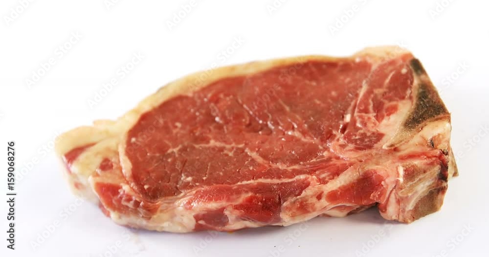 Raw steak on white background Raw steak on white background