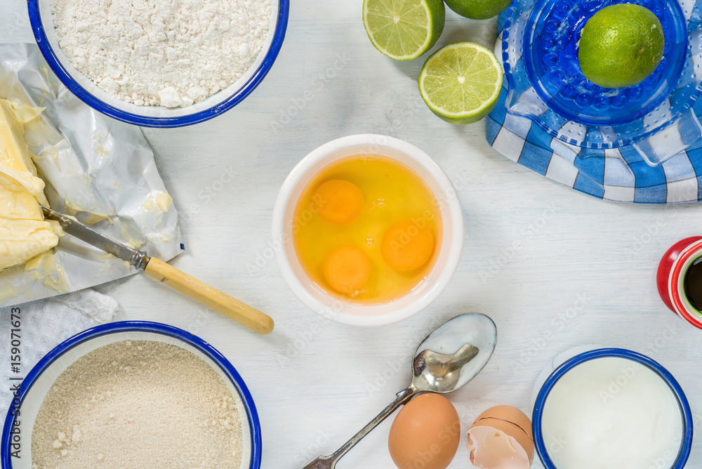 Ingredients for lime cake on white background Ingredients for lime cake on white background