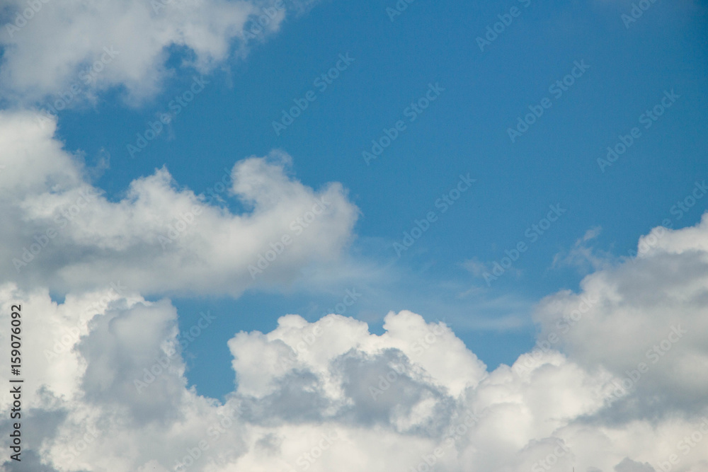 white clouds on blue sky
