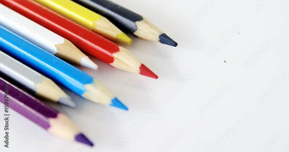 Colored pencils arranged in a wavy pattern Colored pencils arranged in a wavy pattern