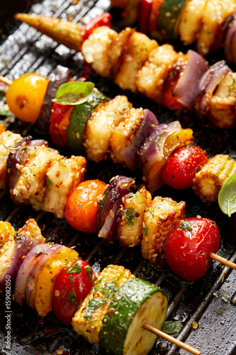 Grilled Vegetarian skewers with halloumi cheese and mixed vegetables on grill plate