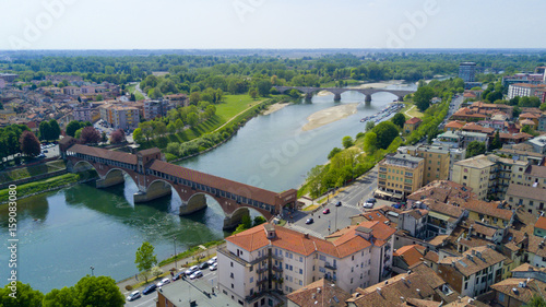 Aerial video shooting with drone on Pavia, famous Lombardia city near the Ticino river in northern Italy photo