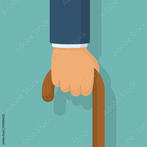 Cane in hand, isolated on white background. Old man's hand hording an old wood walking stick for support. Vector illustration flat design.