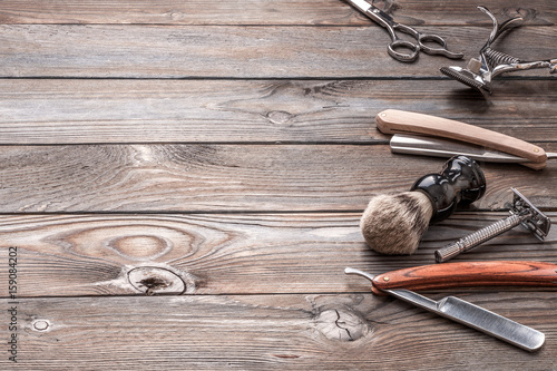 Obraz na płótnie Vintage barber shop tools on wooden background w salonie