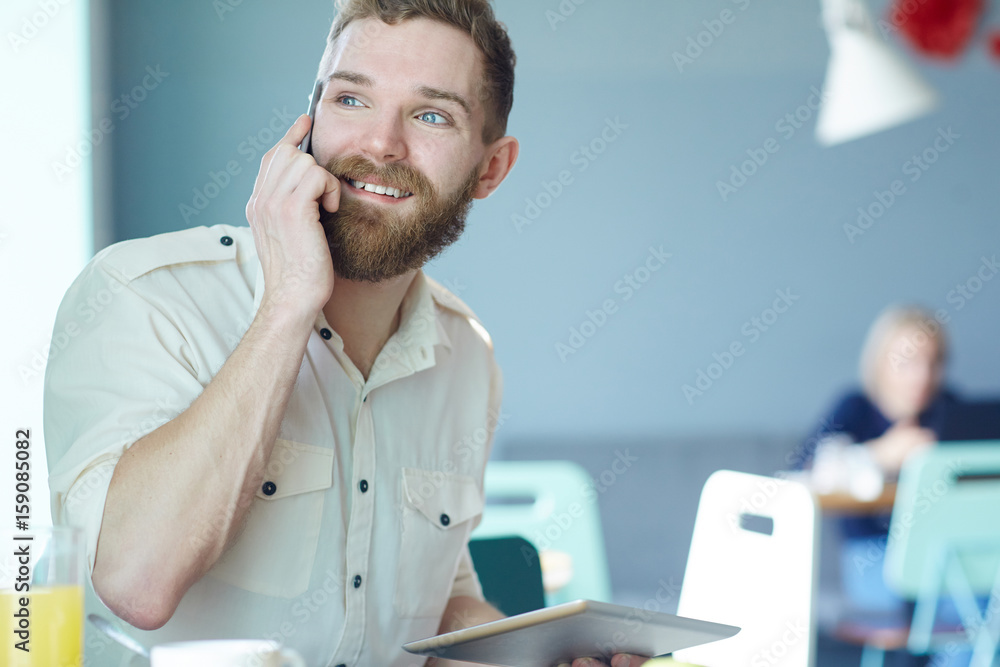 Happy trader talking on mobile phone Happy trader talking on mobile phone