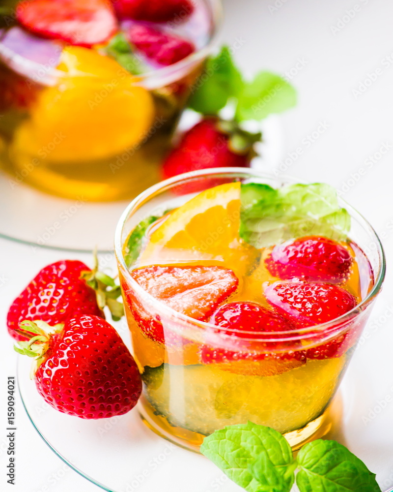 Drink. Pimms in tea cup, white background Drink. Pimms in tea cup, white background