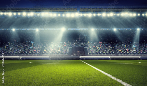 Soccer stadium in spotlights