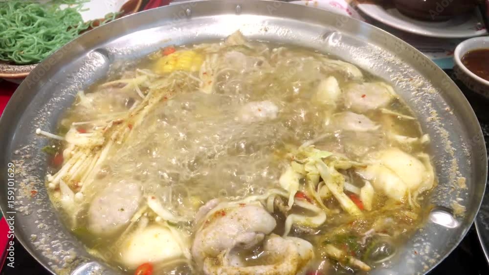 Boiling delicious sukiyaki, Thai style at restaurant Boiling delicious sukiyaki, Thai style at restaurant