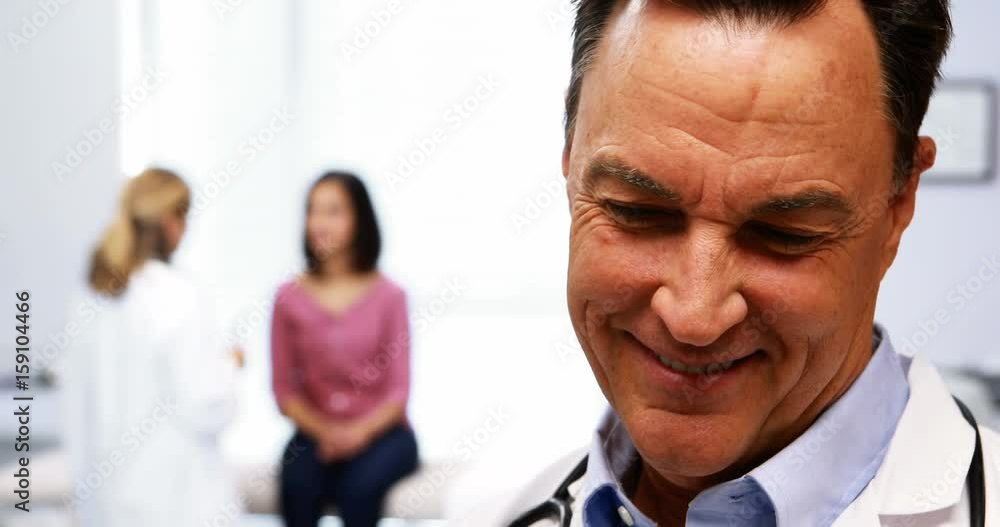 Portrait of smiling male doctor Portrait of smiling male doctor