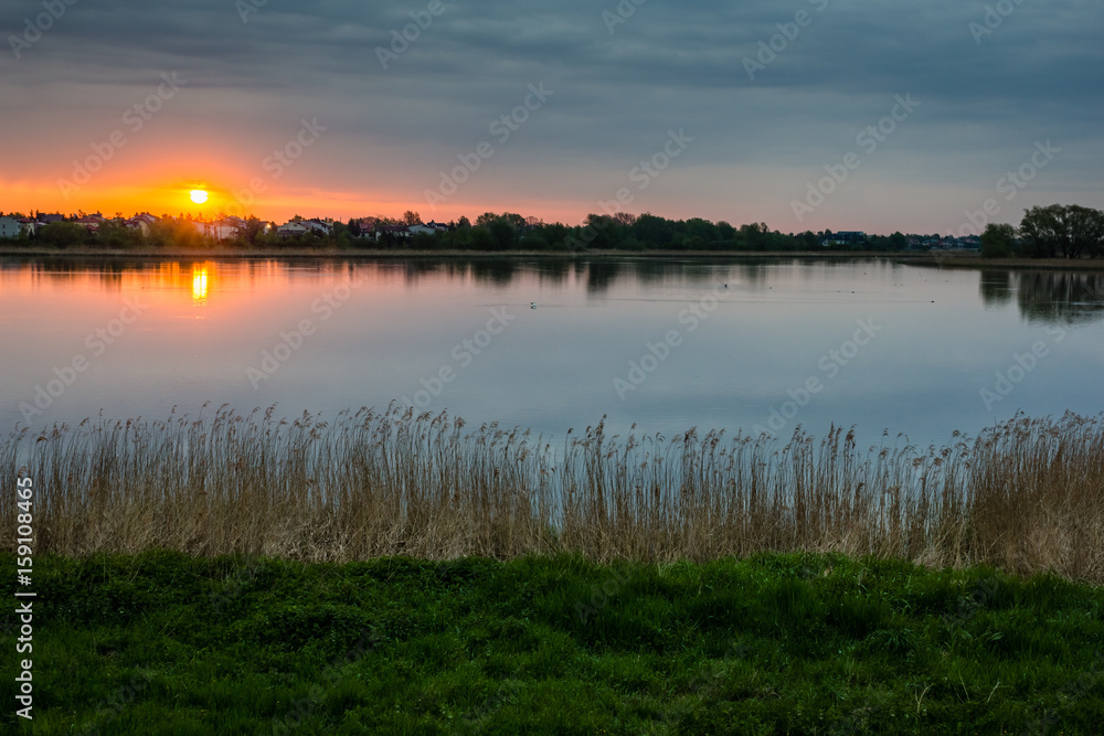Sunset over pond Raszynski near Warsaw, Poland Sunset over pond Raszynski near Warsaw, Poland