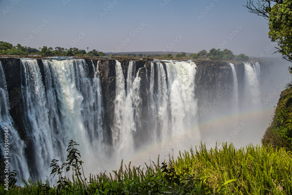 Victoria falls in a sunny day in Zimbabwe