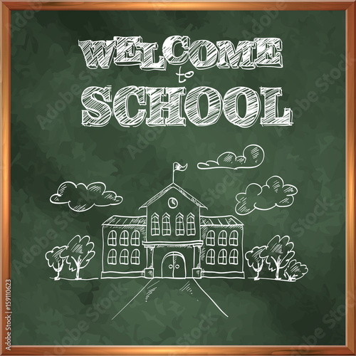 Welcome to school. A blackboard with a picture of the school bui