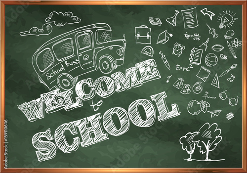 Welcome to school. A blackboard with a school bus and drawings o