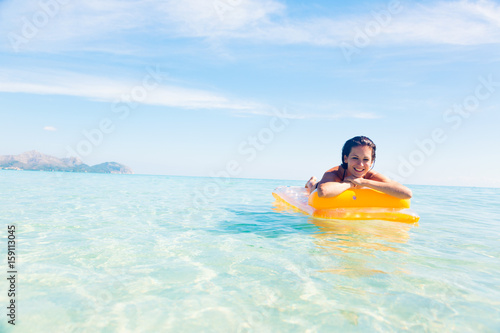 Young Woman With Pool Raft © nullplus