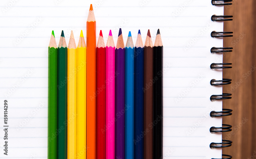 Fototapeta premium pencil color on notebook