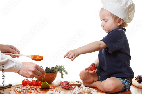 Child in the cook cap with ...