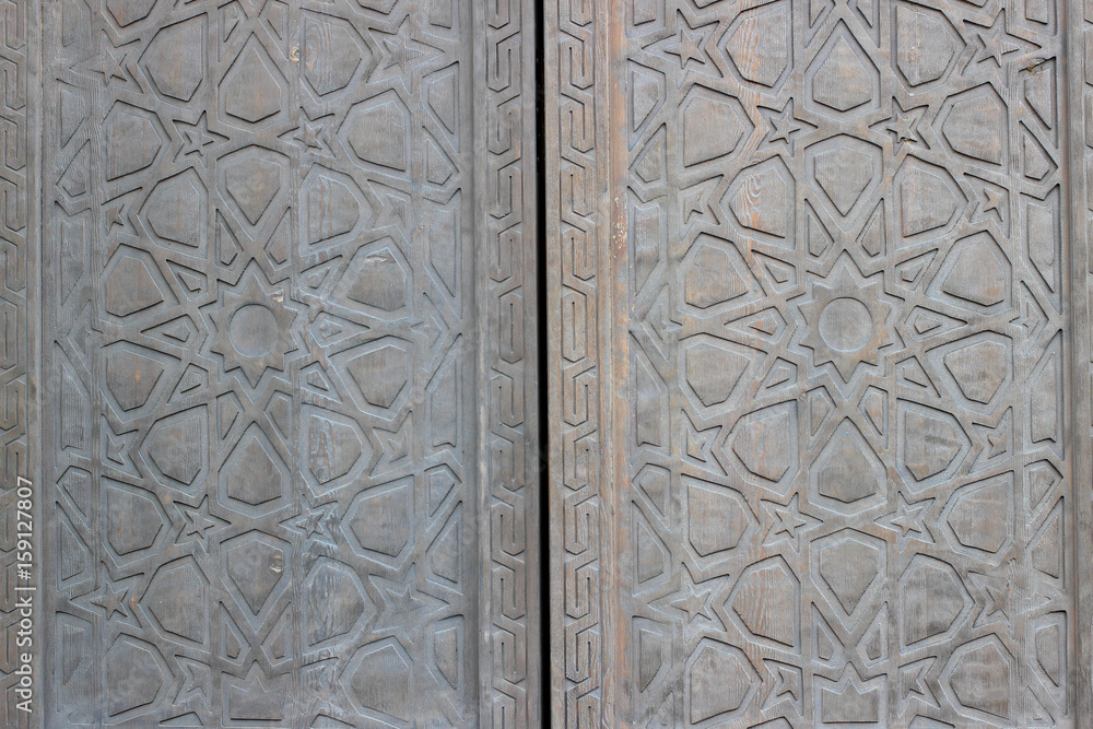 Wooden doors with carved ornaments