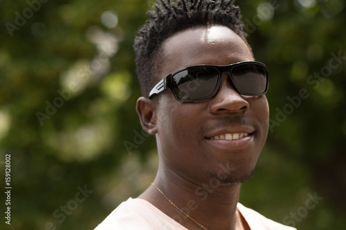 Stylish african american man in sunglasses