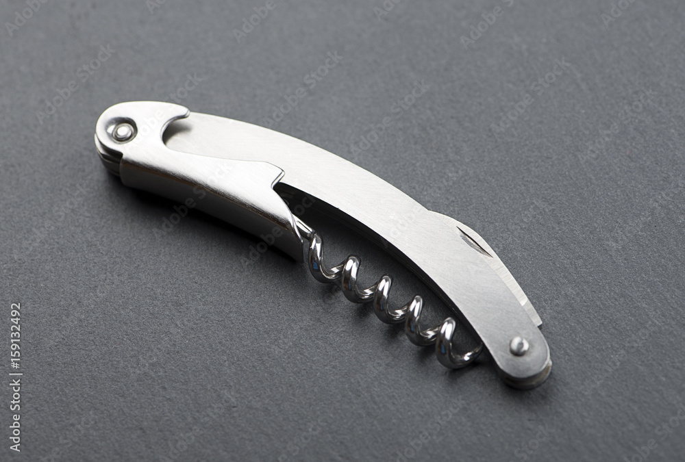 Close-up of corkscrew on blackboard. Horizontal studio shot. Close-up of corkscrew on blackboard. Horizontal studio shot.