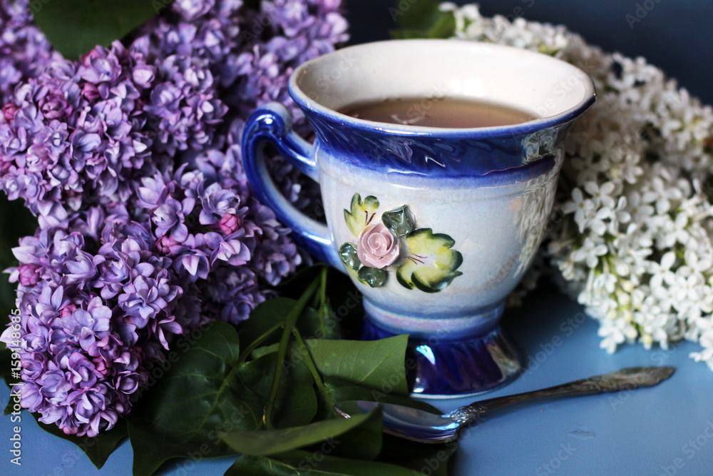 Lilac and a cup of tea, floral useful tea
Lilac and a cup of tea, floral useful tea