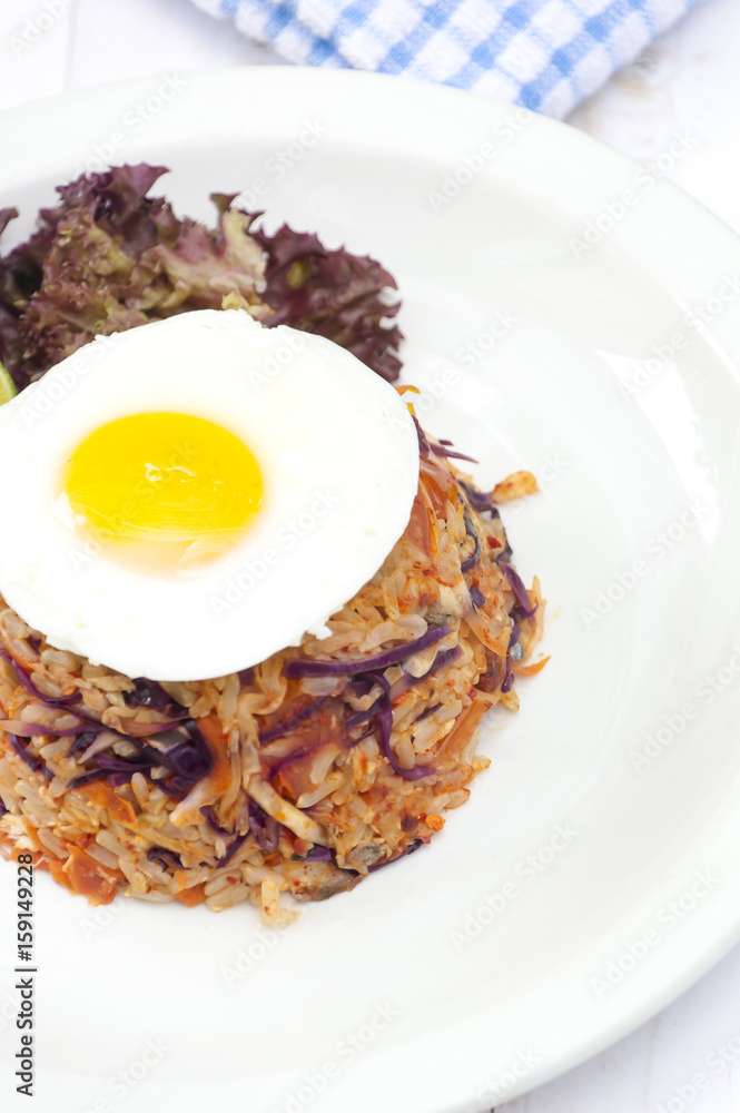 Fried rice with chili shrimp dip and mackerel on wood in garden background. Fried rice with chili shrimp dip and mackerel on wood in garden background.