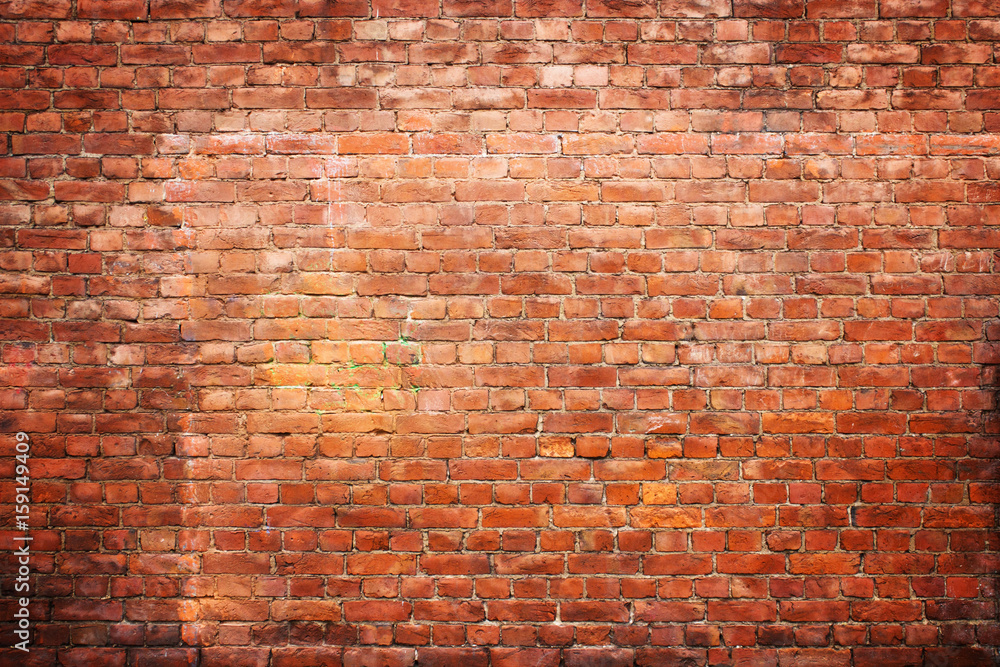Fototapeta premium tekstury rocznika ceglany mur, tło czerwony kamień powierzchni miejskich