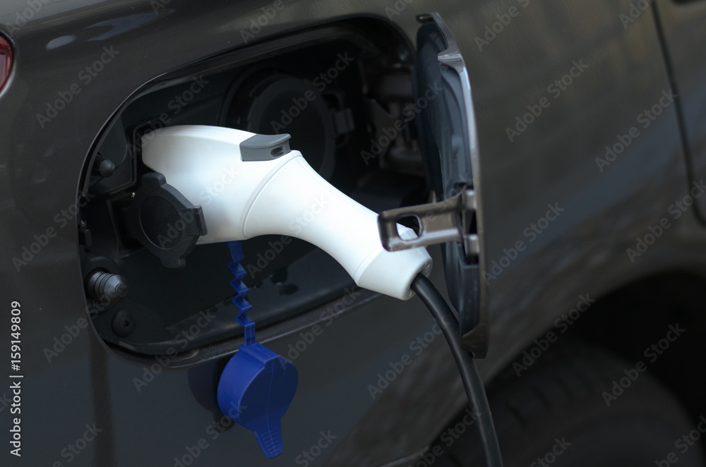 Charging an electric car Charging an electric car