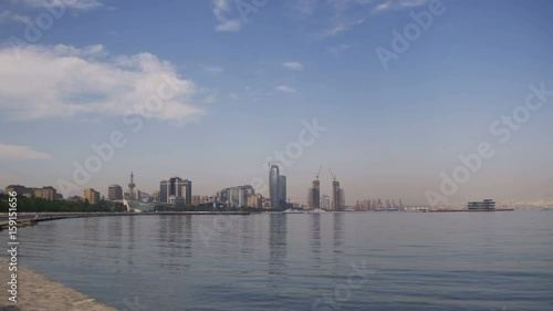 AZERBAIJAN, BAKU, MAY 9, 2017: Embankment of Baku, Azerbaijan. View of the Caspian Sea and the skyscrapers of the city. City view of Baki. photo