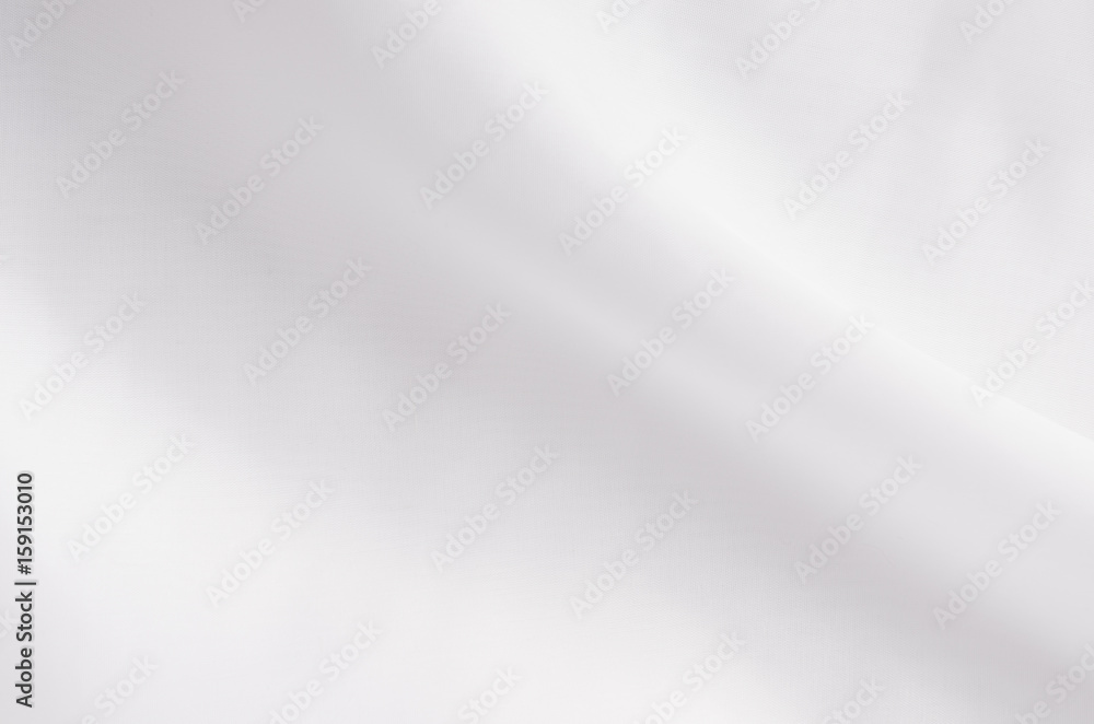 White smooth elegant silk or satin fabric texture with liquid wave. White smooth elegant silk or satin fabric texture with liquid wave.