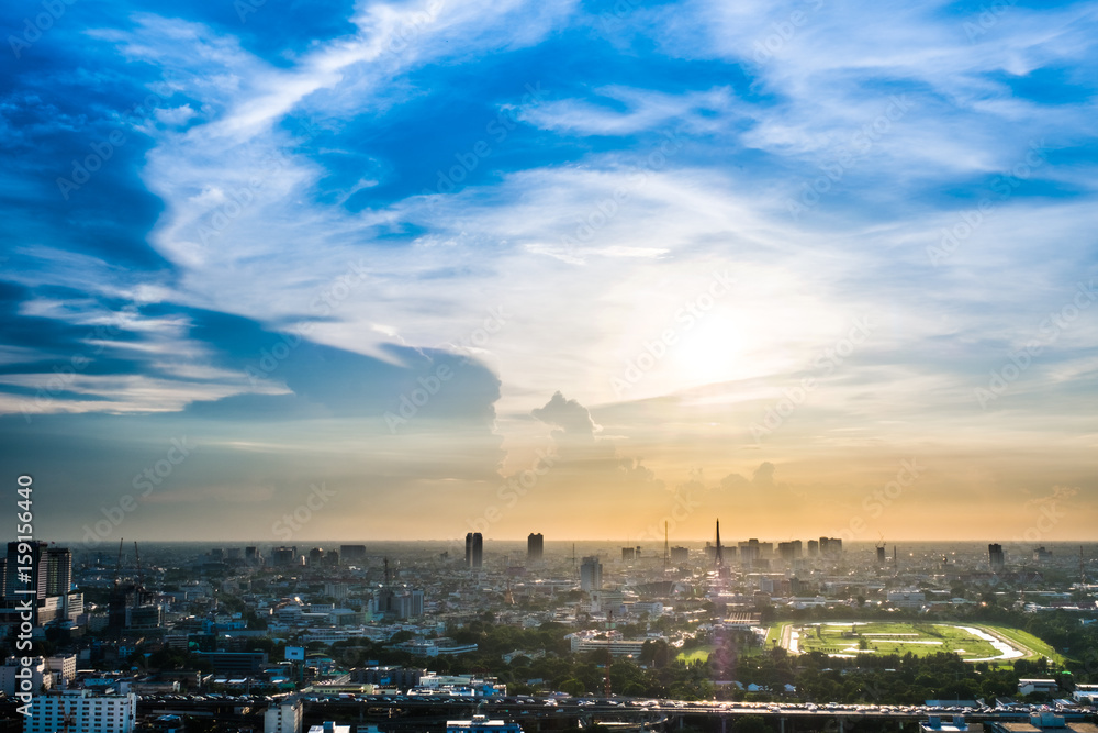 Cityscape with sunset, sky and clouds in Bangkok, Thailand