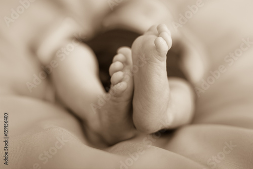 Closeup of tiny baby feet.