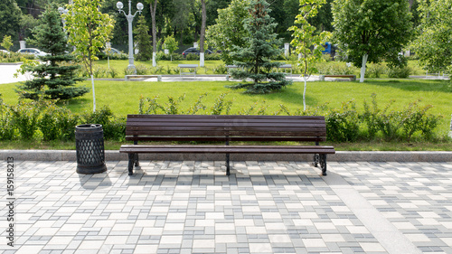 Wooden bench in the city park