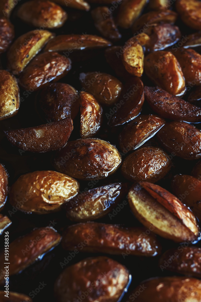 Roasted new potatoes, close up Roasted new potatoes, close up