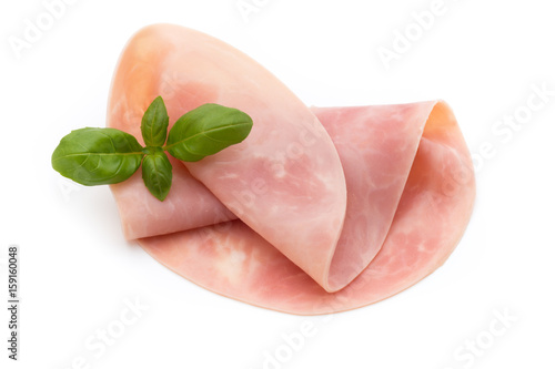 Thin slices of ham on white background.