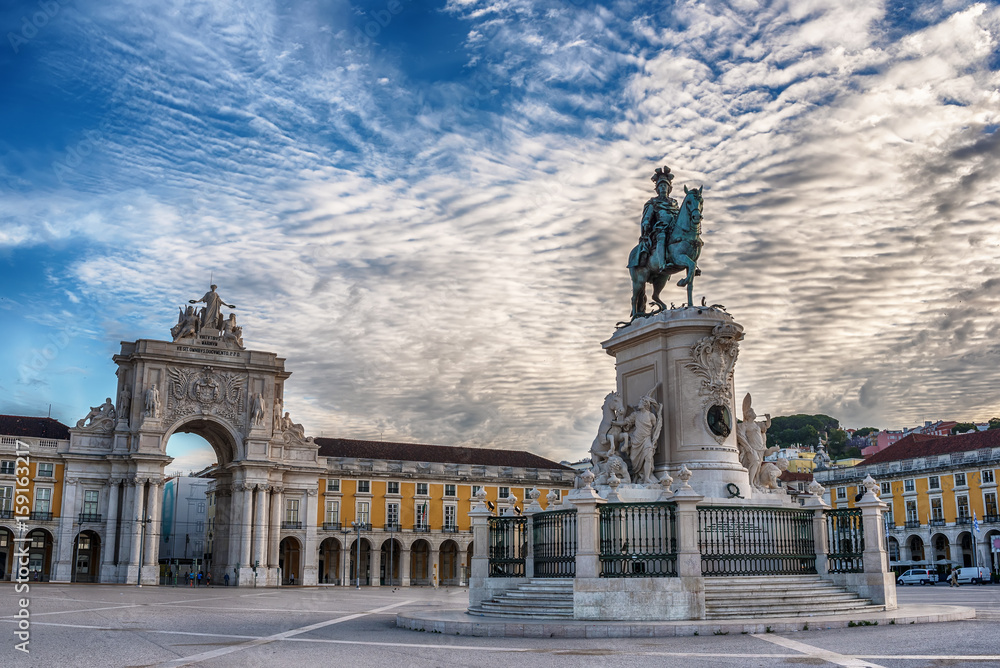 Lisbon, Portugal: the Triumphal Rua Augusta Arch, Arco Triunfal da Rua Augusta, Praca do Comercio and Statue of King Jose I at sunrise 
