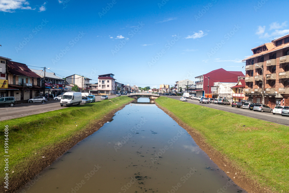 Obraz premium CAYENNE, FRENCH GUIANA - AUGUST 1, 2015: Canal Laussat in the center of Cayenne, capital of French Guiana.