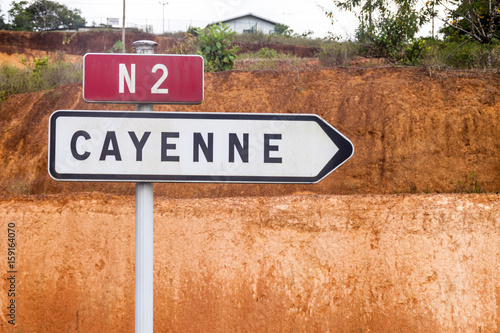 Roadsign (located in Saint-Georges) pointing to Cayenne, French Guiana