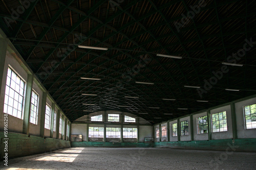 Sandy covering abandoned training arena for riders and horsemen