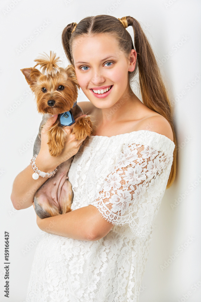 Girl with yorkie dog